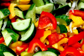 cucumbers, bell peppers and onions, cut into large pieces, prepared for cooking