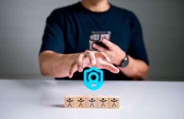 Data protection and cybersecurity concept with a businessman securing personal user data. Digital...