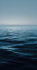 Obraz premium Calm, vast ocean surface. Gentle ripples blur into a serene expanse