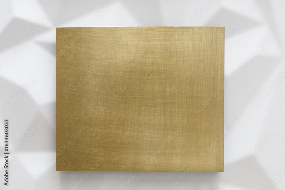 Poster high-resolution image of a gold textured background. perfect for mockups and design projects.