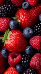 Obraz premium Fresh Assorted Berries Close-Up for Healthy Eating