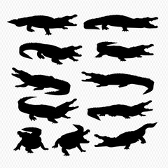 A collection of twelve black crocodile and alligator silhouettes in various dynamic and static poses.