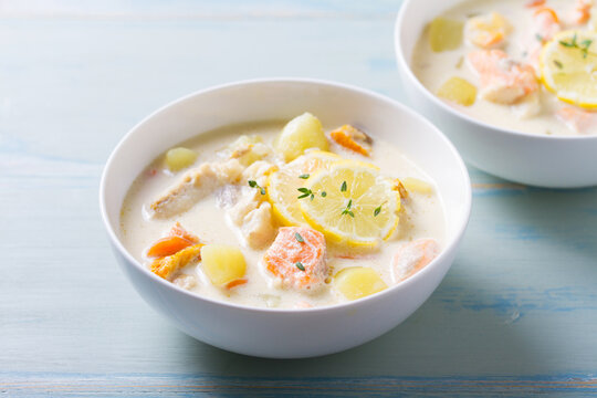 Thick soup chowder made with salmon, white fish, shrimps and vegetables