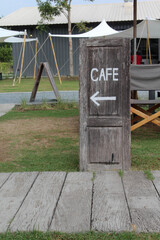 Cafe sign made from a wooden door