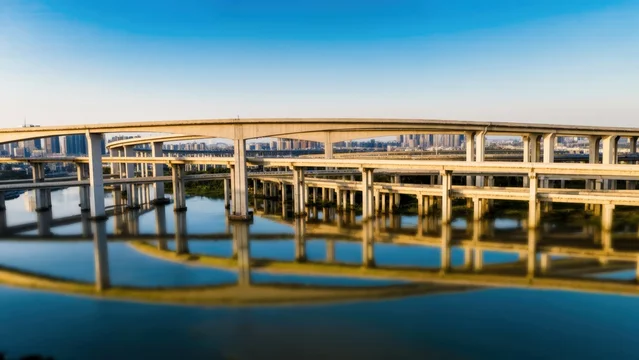 Drone Shot of Massive City Infrastructure with Dramatic Shadows
