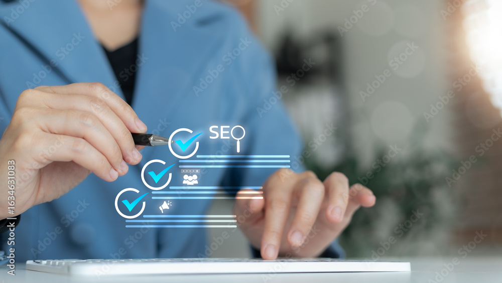 Aufkleber business using pen and keyboard with virtual seo checklist icons. concepts of search engine optimiza