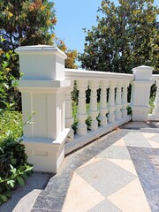 Balcony railings with white marble balusters