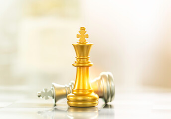 Gold chess king wins. Success in business competition, a victory and achievement concept.