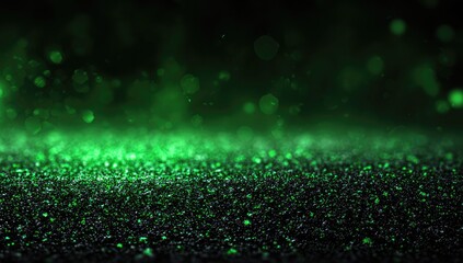 Dark background with shimmering green glitter