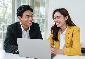Collaborative Meeting of Young Asian Professionals in a Bright Office Environment