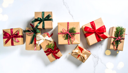 Beautifully Wrapped Holiday Gifts in Various Sizes Arranged on a Marble Background