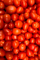 Bright, juicy, ripe and large tomatoes close-up