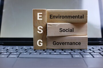 Blocks Representing ESG on a Laptop Symbolizing Corporate Responsibility