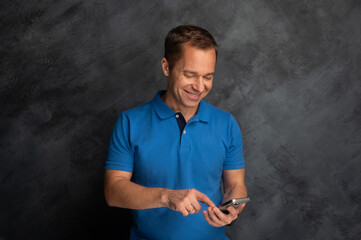 Middle Aged Man Expressing Emotions During a Phone Call