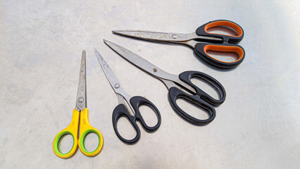 various types of scissors on a white background