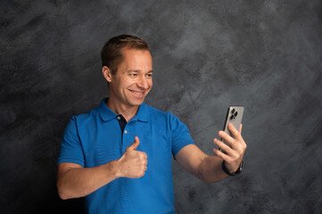 Middle Aged Man Expressing Emotions During a Phone Call