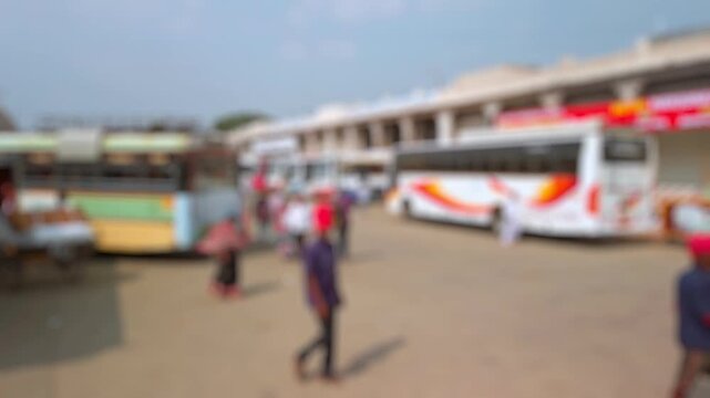 Bokeh view of bus station in Tirupati, India. Blurred background footage.