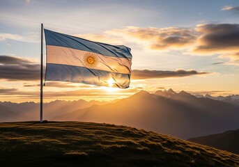 Majestic Argentine Flag Flying High Above Mountains During a Radiant Sunset.