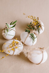 Traditional Easter cakes (kulich) with glaze, nuts, and dried fruits. Rustic still lifes with milk, eggs, willow branches, gift boxes, and festive decorations for Orthodox Easter celebration.