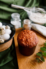 Traditional Easter cakes (kulich) with glaze, nuts, and dried fruits. Rustic still lifes with milk, eggs, willow branches, gift boxes, and festive decorations for Orthodox Easter celebration.