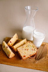 Traditional Easter cakes (kulich) with glaze, nuts, and dried fruits. Rustic still lifes with milk, eggs, willow branches, gift boxes, and festive decorations for Orthodox Easter celebration.
(198 сим