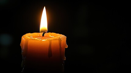 Burning Candle with Wax Drips on Dark Background 