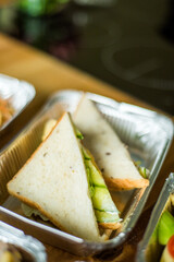 Healthy ready meals in eco and plastic containers: salads, soups, rice bowls, sandwiches and...