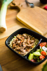 Healthy ready meals in eco and plastic containers: salads, soups, rice bowls, sandwiches and...