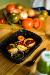 Healthy ready meals in eco and plastic containers: salads, soups, rice bowls, sandwiches and...