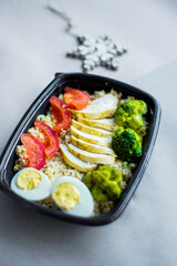 Healthy ready meals in eco and plastic containers: salads, soups, rice bowls, sandwiches and...