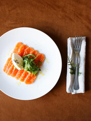 Festive and everyday meals: from waffles and pancakes with jam to salmon, salads, baked chicken, and takeaway food. Seasonal table settings and healthy food in catering or home-style presentation.