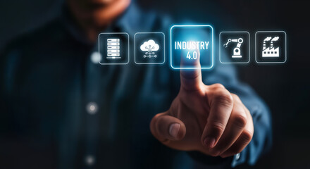 Hand pressing button with industry 4.0 text and icons representing smart factory automation, digital transformation, and advanced technology