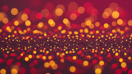 Abstract bokeh of red and gold lights.
