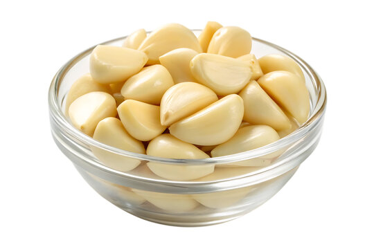 Peeled garlic cloves in glass bowl on transparent background