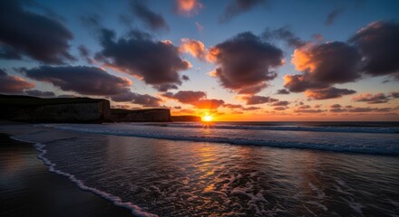 Dramatic sunset over a coastal beach