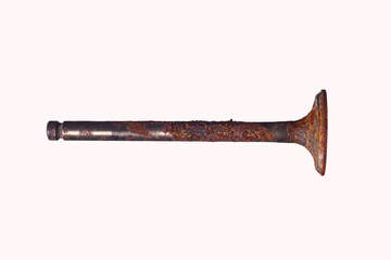 Old used car engine valve isolated on white background.