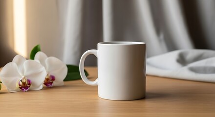 Fototapeta premium Minimalist styled white mug placed on a wooden table with white orchids near it.