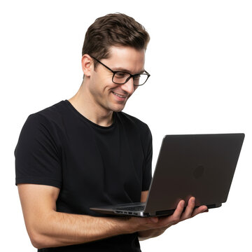 Smiling man wearing glasses and a black t shirt holding a laptop computer isolated on transparent background