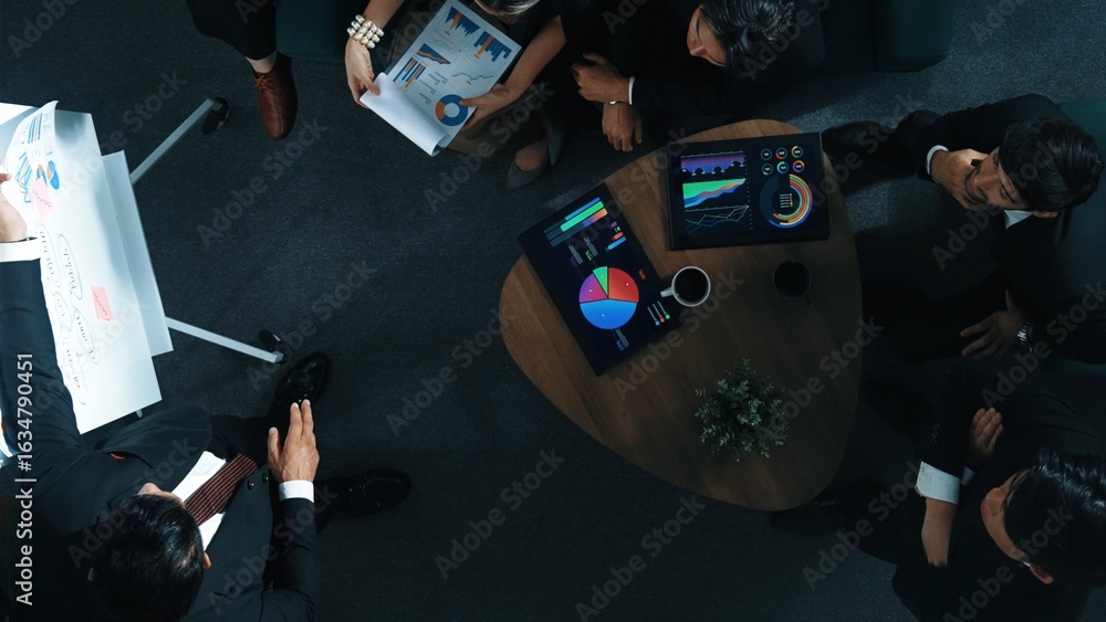 Aufkleber top down view of business people listen businessman present idea while making decision. group of div