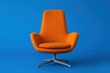 Modern orange lounge chair with high backrest on vibrant blue background
