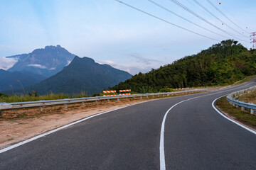 Mt. Kinabalu and asphalt road Kota Belud Sabah Malaysia