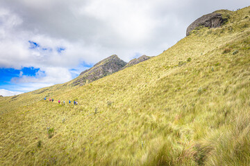 Pichincha Province, Quito, Ecuador - July 5, 2025: Hikers climb to the summit of Pasochoa Volcano,...