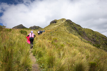 Pichincha Province, Quito, Ecuador - July 5, 2025: Hikers climb to the summit of Pasochoa Volcano,...