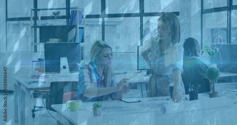 Poster designer duo pointing pencil at chart while colleague sipping coffee and aligning blueprint layout