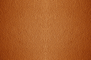 brown red orange plaster wall with fur coat pattern as background. Textured background. Decorative plaster walls, external decoration of facade. Texture of beige. background,  cement exterior fence