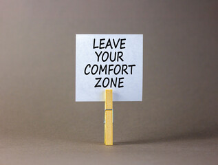 Leave your comfort zone symbol. Concept words Leave your comfort zone on beautiful white paper....