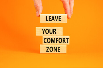 Leave your comfort zone symbol. Concept words Leave your comfort zone on beautiful wooden blocks....