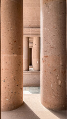 Architectural symmetry with stone columns and soft light