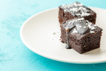 Vegan chocolate brownie on plate close up