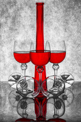 Still life with a bottle and glass glasses with wine